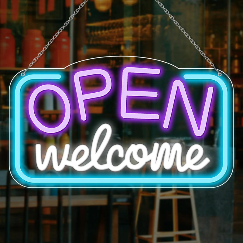 Open Welcome Business Neon Sign by Neon.Shop glowing in a storefront window