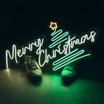Pine Tree Merry Christmas Neon Sign by Neon.Shop featuring glowing pine tree design with festive lettering.