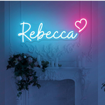 Rebecca Name LED Neon Sign in custom LED tubing, personalized wall-mounted name light décor by Neon.Shop for bedrooms, events, and gifts.