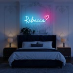 Rebecca Name LED Neon Sign in custom LED tubing, personalized wall-mounted name light décor by Neon.Shop for bedrooms, events, and gifts.