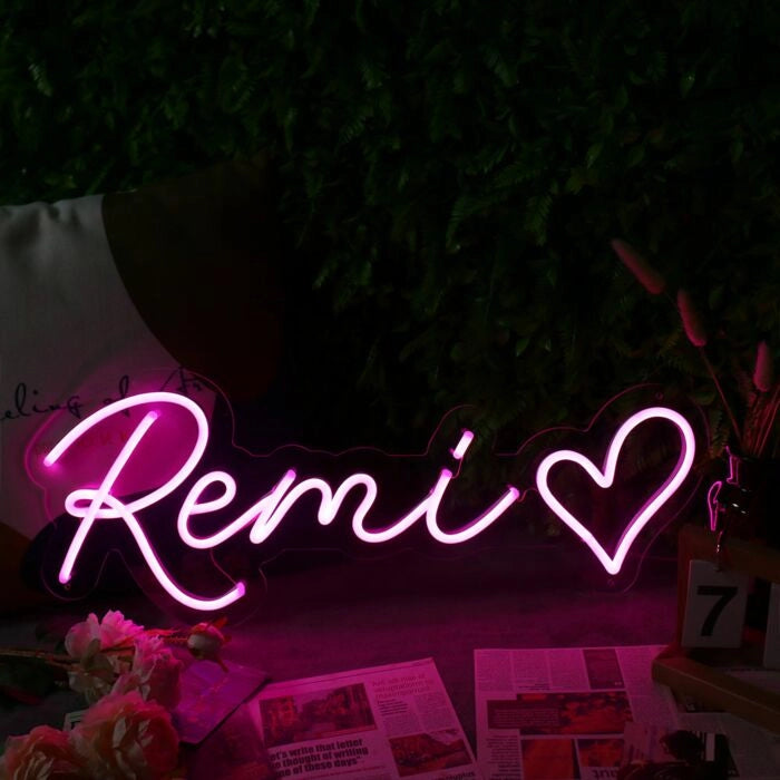Remi Name LED Neon Sign in customizable LED tubing, personalized wall-mounted name light décor by Neon.Shop for bedrooms, events, and gifts.