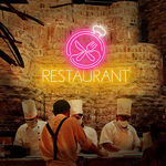 Restaurant Business Neon Sign by Neon.Shop glowing brightly above the entrance of a dining establishment, attracting diners day and night