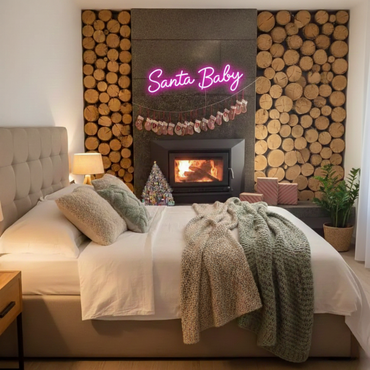 Santa Baby Merry Christmas Neon Sign by Neon.Shop glowing in LED light with playful holiday lettering design.