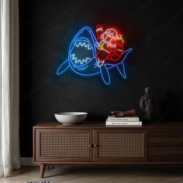 Santa Claus riding a shark Merry Christmas LED neon sign glowing in vibrant festive colors by Neon.Shop.