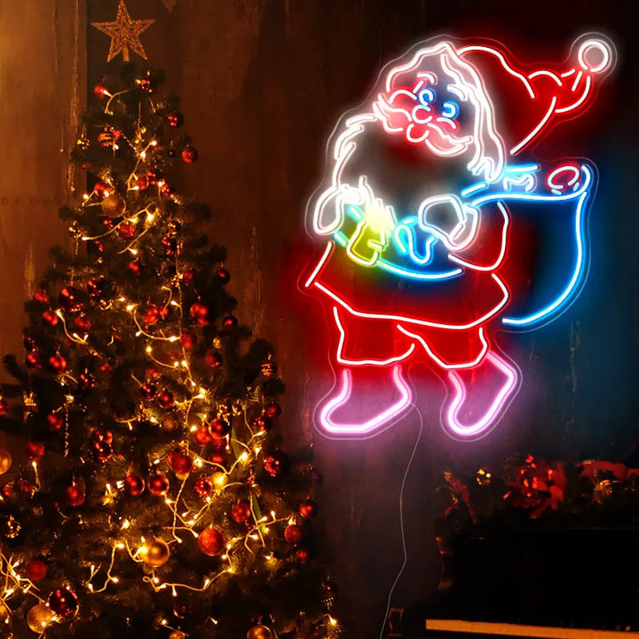 Santa Claus with Sack Neon Sign by manhattanneons.com - Bring festive cheer to your space with this Santa Claus neon sign.
