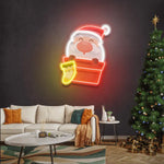 Santa with Sock Merry Christmas Neon Sign featuring Santa with Sock from Neon.Shop
