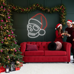 Skeleton Merry Christmas LED neon sign glowing in festive colors by Neon.Shop.