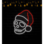 Skeleton Merry Christmas LED neon sign glowing in festive colors by Neon.Shop.