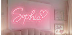 SOPHIA LED Neon Name Sign by Neon.Shop adding vibrant LED glow to bedrooms, home offices, and living spaces.