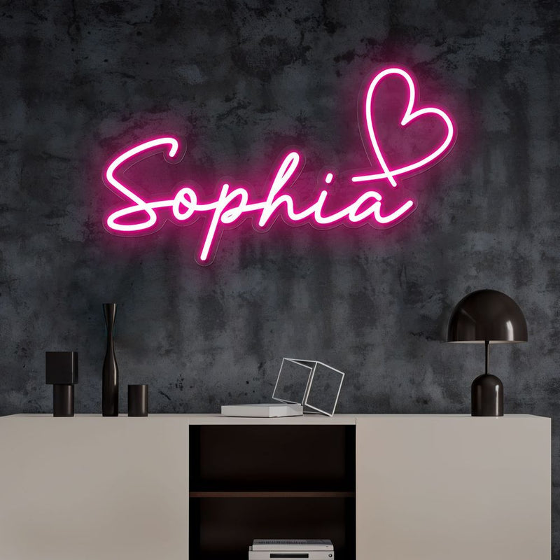 SOPHIA LED Neon Name Sign by Neon.Shop adding vibrant LED glow to bedrooms, home offices, and living spaces.