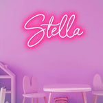 Stella Name LED Neon Sign in customizable LED tubing, personalized wall-mounted name light décor by Neon.Shop for bedrooms, events, and gifts.