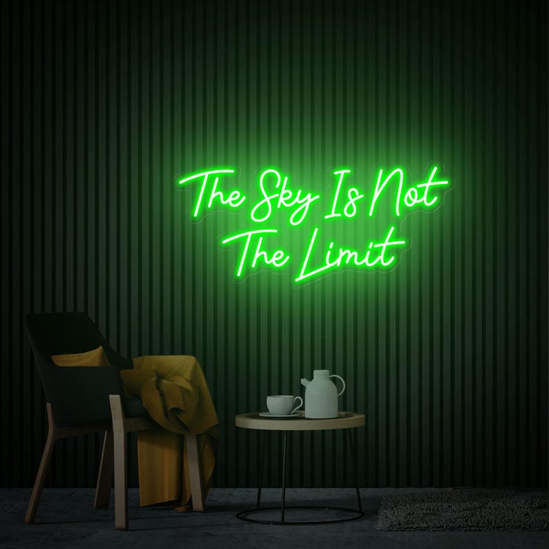 The Sky Is Not The Limit” inspirational LED neon wall light, perfect for creative spaces, gyms, and home workspaces by Neon.Shop.
