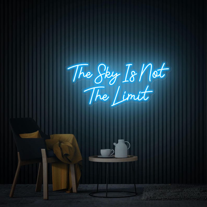 The Sky Is Not The Limit” inspirational LED neon wall light, perfect for creative spaces, gyms, and home workspaces by Neon.Shop.