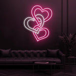 Three hearts love Valentine’s Day LED neon sign by Neon.Shop featuring three connected heart shapes that symbolize romance, unity, and affection