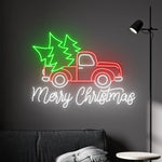 Truck Merry Christmas LED neon sign glowing in festive colors by Neon.Shop.