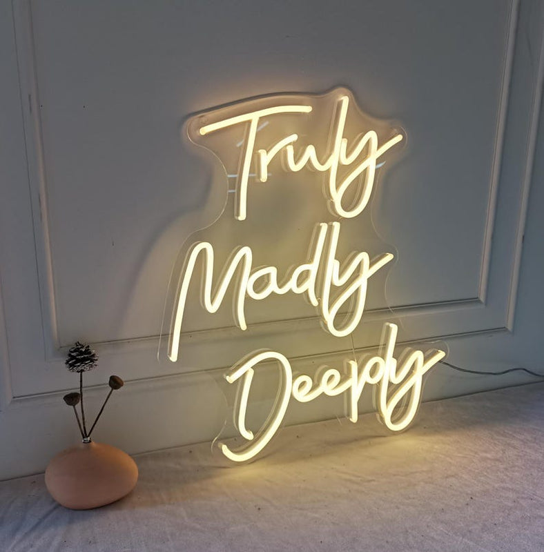 Romantic Truly, Madly, Deeply neon sign for wedding décor by Neon.Shop