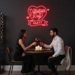 Valentine’s Day Party” LED neon sign glowing in pink and red tones, perfect for romantic and festive décor by Neon.Shop
