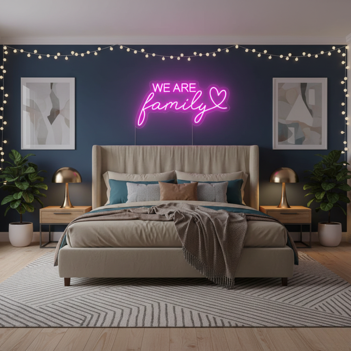We Are Family LED neon sign by Neon.Shop glowing on a wall as inspirational and cozy neon home décor