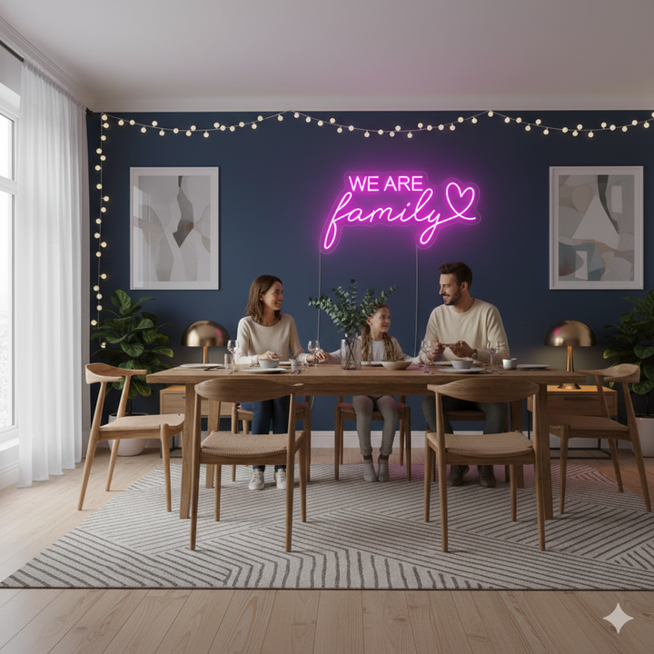 We Are Family LED neon sign by Neon.Shop glowing on a wall as inspirational and cozy neon home décor