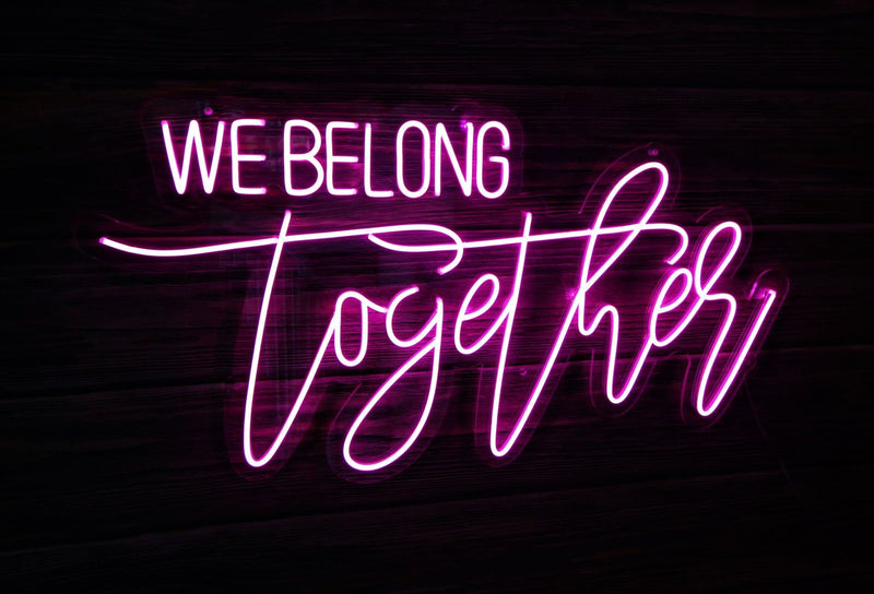 We Belong Together Wedding LED Neon Sign glowing at reception by Neon.Shop