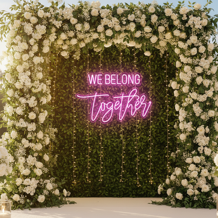 We Belong Together Wedding LED Neon Sign glowing at reception by Neon.Shop