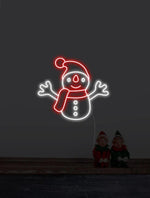 White and Red Snowman Merry Christmas Neon Sign by Neon.Shop featuring a glowing snowman design with festive Christmas lettering.