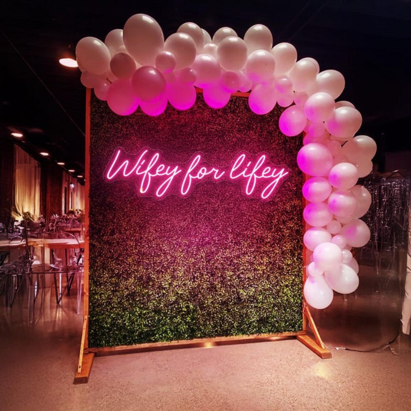 Wifey for Lifey wedding LED neon sign glowing on backdrop – Neon.Shop