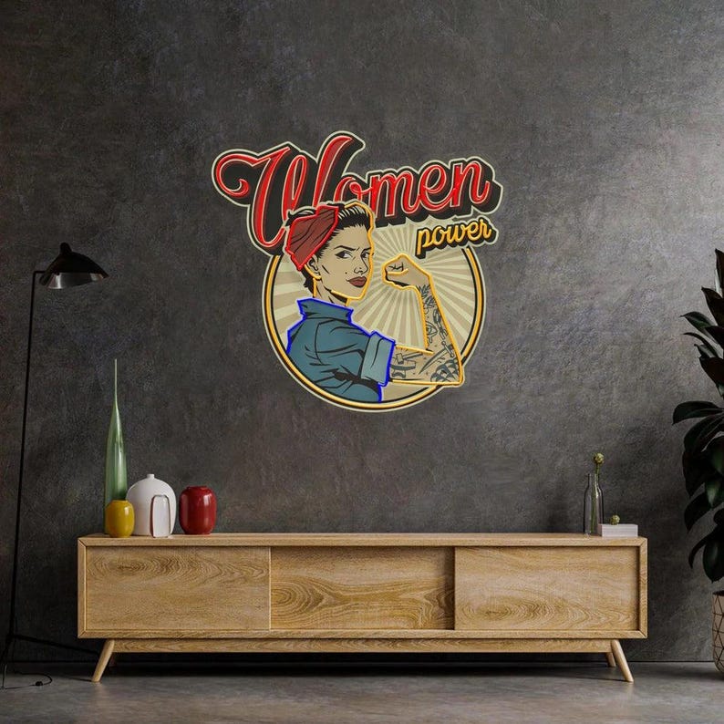 Women In Power UV Art LED neon sign with bold empowering design glowing in vibrant colors by Neon.Shop