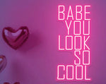 You Look So Cool Babe Valentine’s Day LED neon sign by Neon.Shop glowing in vibrant light with modern lettering, ideal for bedrooms, living spaces, cafés, Valentine’s décor, and photo backdrops.