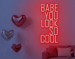You Look So Cool Babe Valentine’s Day LED neon sign by Neon.Shop glowing in vibrant light with modern lettering, ideal for bedrooms, living spaces, cafés, Valentine’s décor, and photo backdrops.