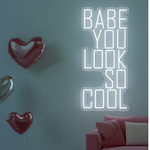 You Look So Cool Babe Valentine’s Day LED neon sign by Neon.Shop glowing in vibrant light with modern lettering, ideal for bedrooms, living spaces, cafés, Valentine’s décor, and photo backdrops.