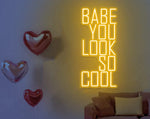 You Look So Cool Babe Valentine’s Day LED neon sign by Neon.Shop glowing in vibrant light with modern lettering, ideal for bedrooms, living spaces, cafés, Valentine’s décor, and photo backdrops