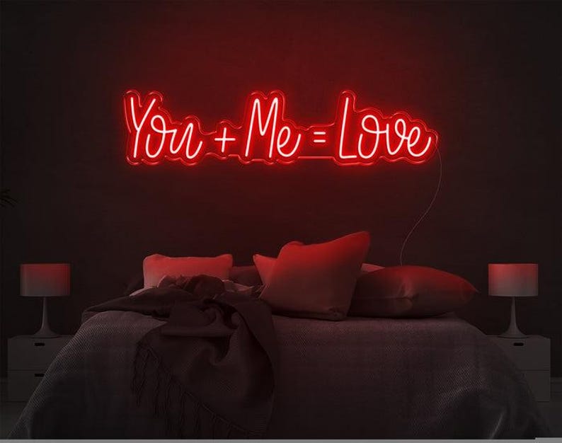 You Me Love Valentine’s Day Neon Sign glowing on wall for romantic décor by Neon.Shop
