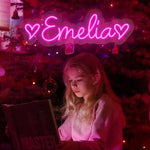 EMELIA Name LED Neon Sign by Neon.Shop glowing brightly, custom LED name light for bedroom décor, nurseries, beauty studios, parties, and modern home styling.