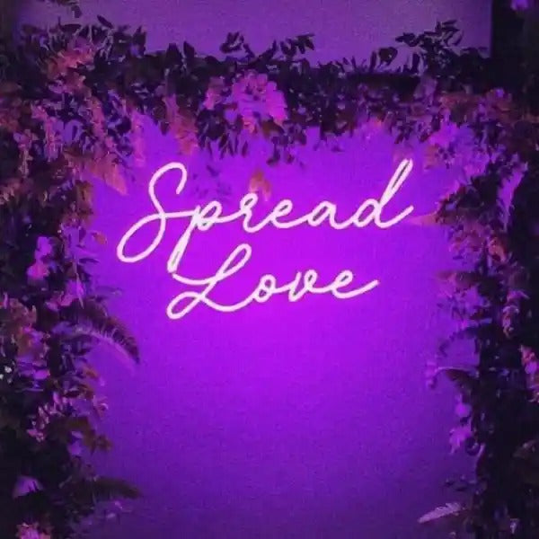 Spread Love Neon Sign in bright LED colors for bedrooms, living rooms, cafés, or event décor From Neon.Shop