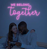 We Belong Together Wedding LED Neon Sign glowing at reception by Neon.Shop