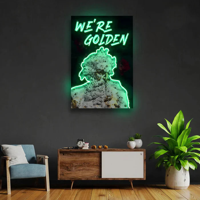 We’re Golden UV Art LED Neon Sign with bright UV art glow, motivational LED wall décor by Neon.Shop