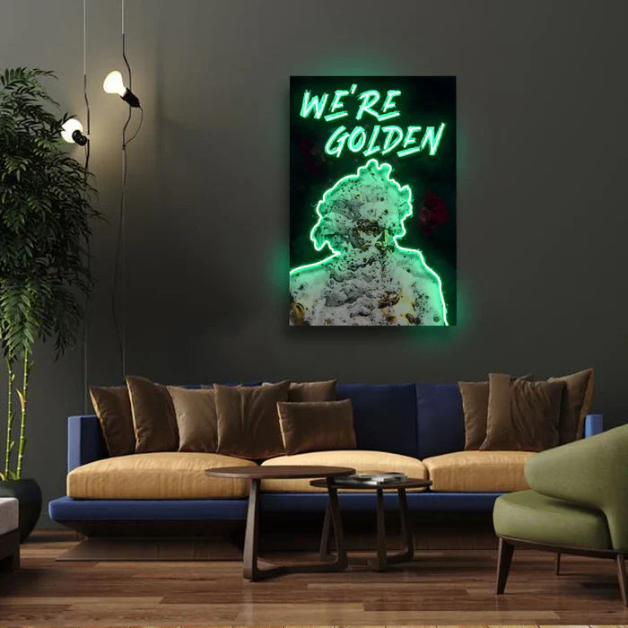 We’re Golden UV Art LED Neon Sign with bright UV art glow, motivational LED wall décor by Neon.Shop