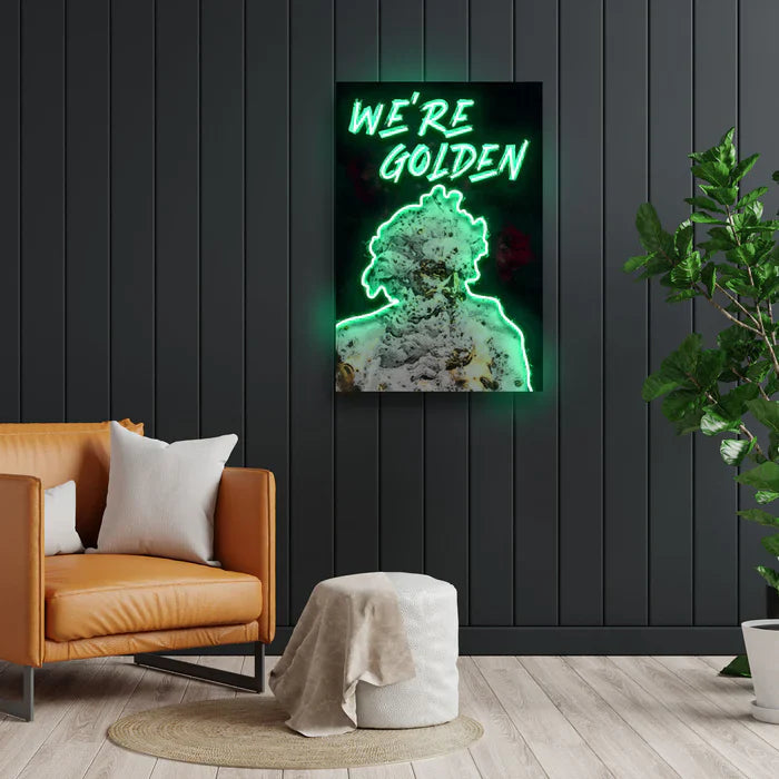We’re Golden UV Art LED Neon Sign with bright UV art glow, motivational LED wall décor by Neon.Shop
