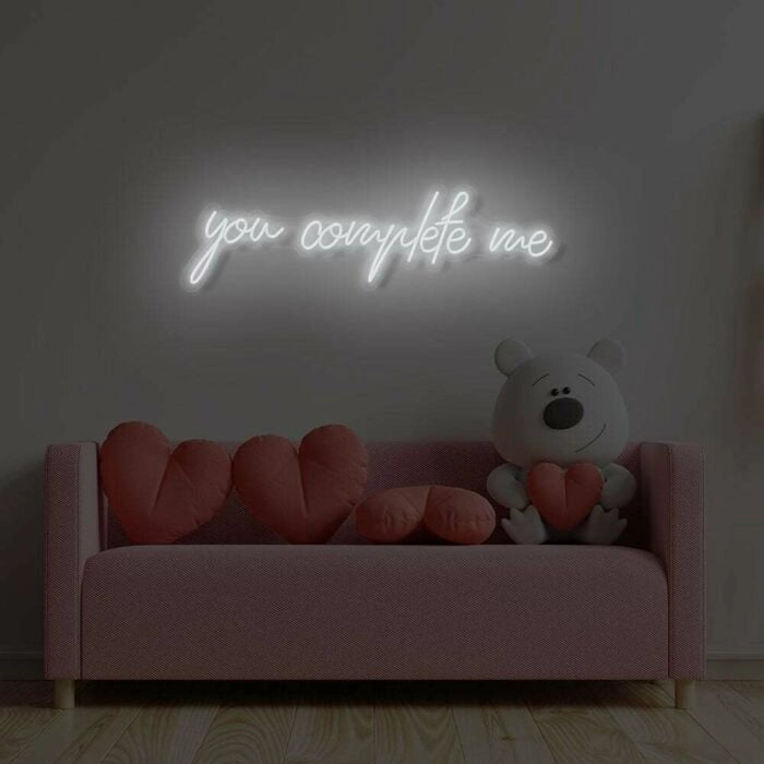 You Complete Me Wedding LED Neon Sign glowing at reception by Neon.Shop  -  Cool white 